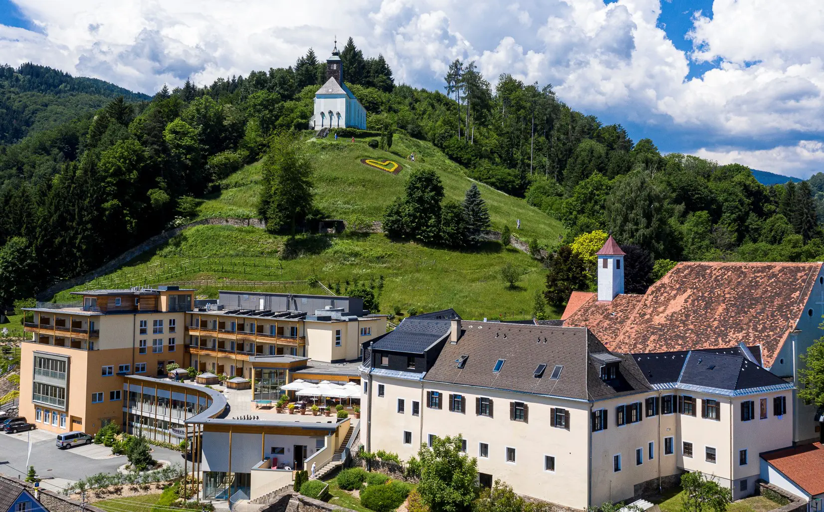a picture from the whole complex of Spa Heilmoorbad, in the background you see the main hill of Bad Schwanberg town and church at the top.